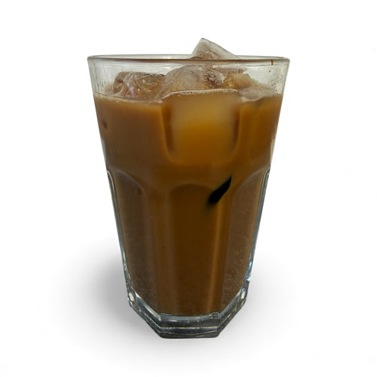 Glass of iced coffee with ice cubes on a white background